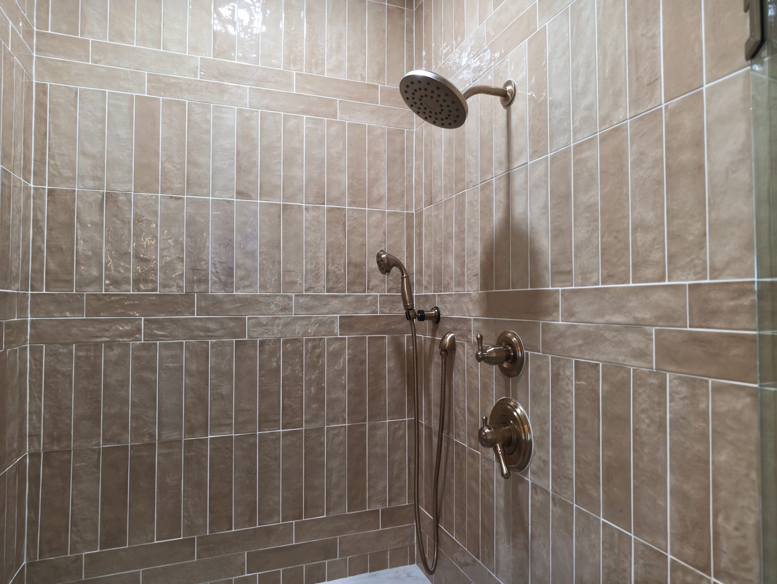 Shower wall of 3x12 glossy porcelain with rain head and handheld Noblesville Indiana