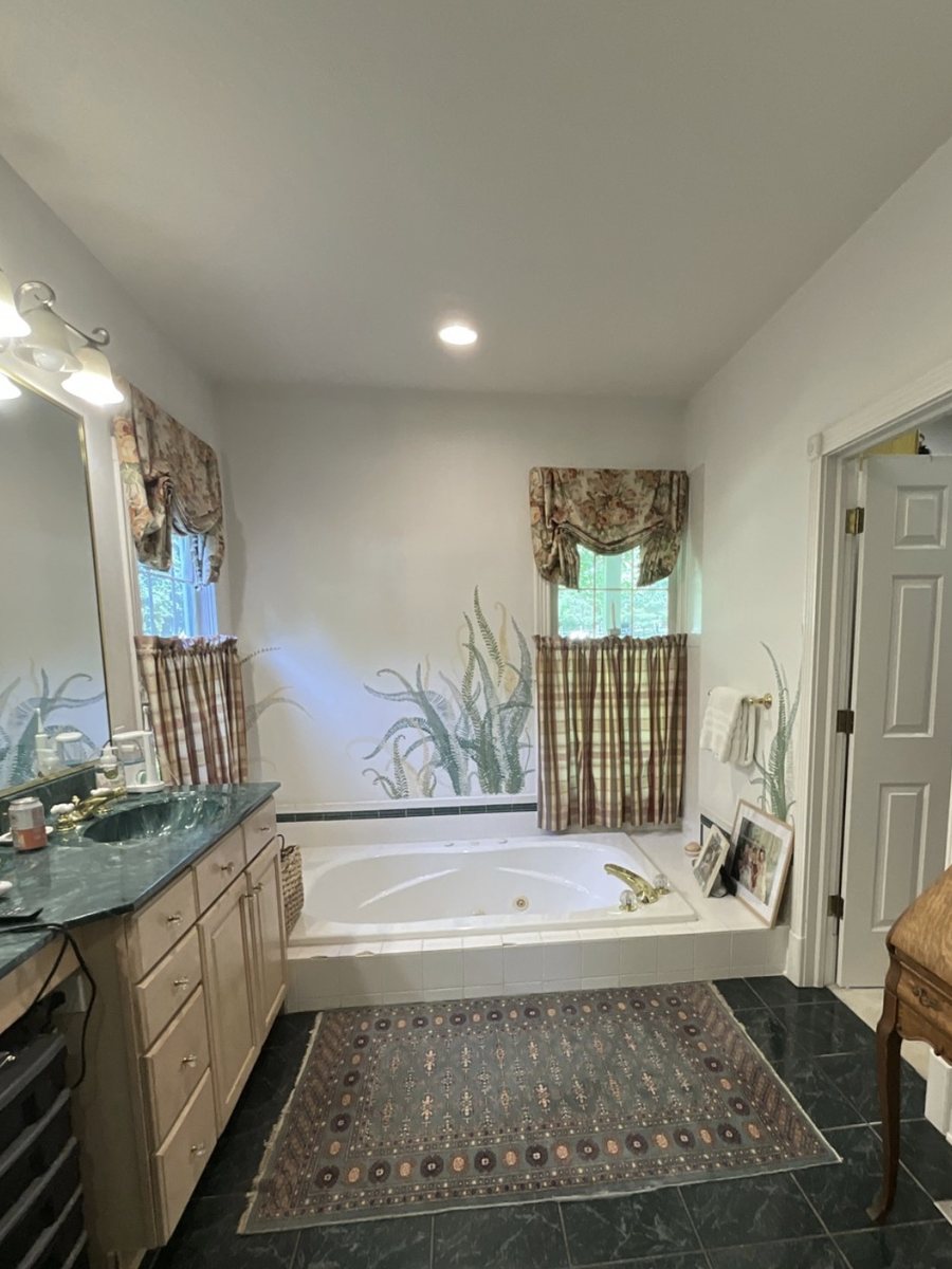 Primary bathroom tub wall in Noblesville IN — before