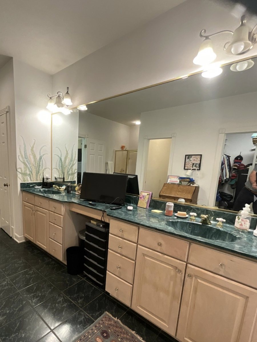 Primary bathroom vanity wall in Noblesville IN — before