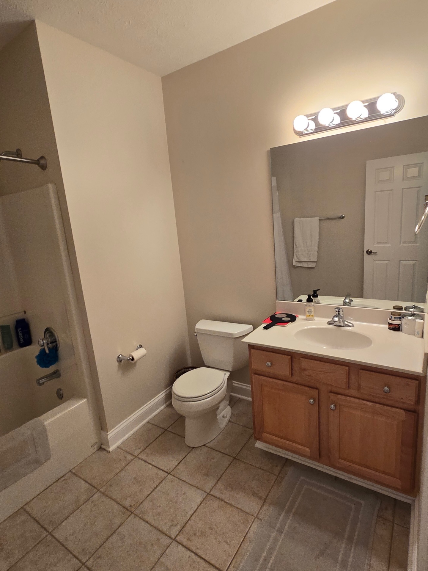 Marble-look porcelain tile basement bathroom Carmel IN