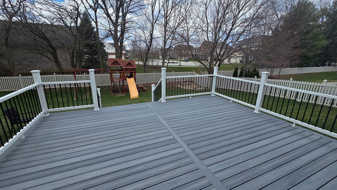 Custom composite deck with white railing Fishers IN