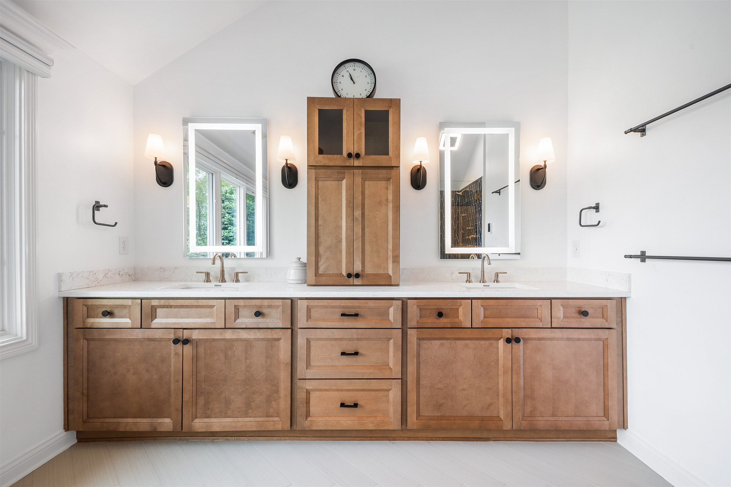 Wood vanity double sink bathroom Geist area