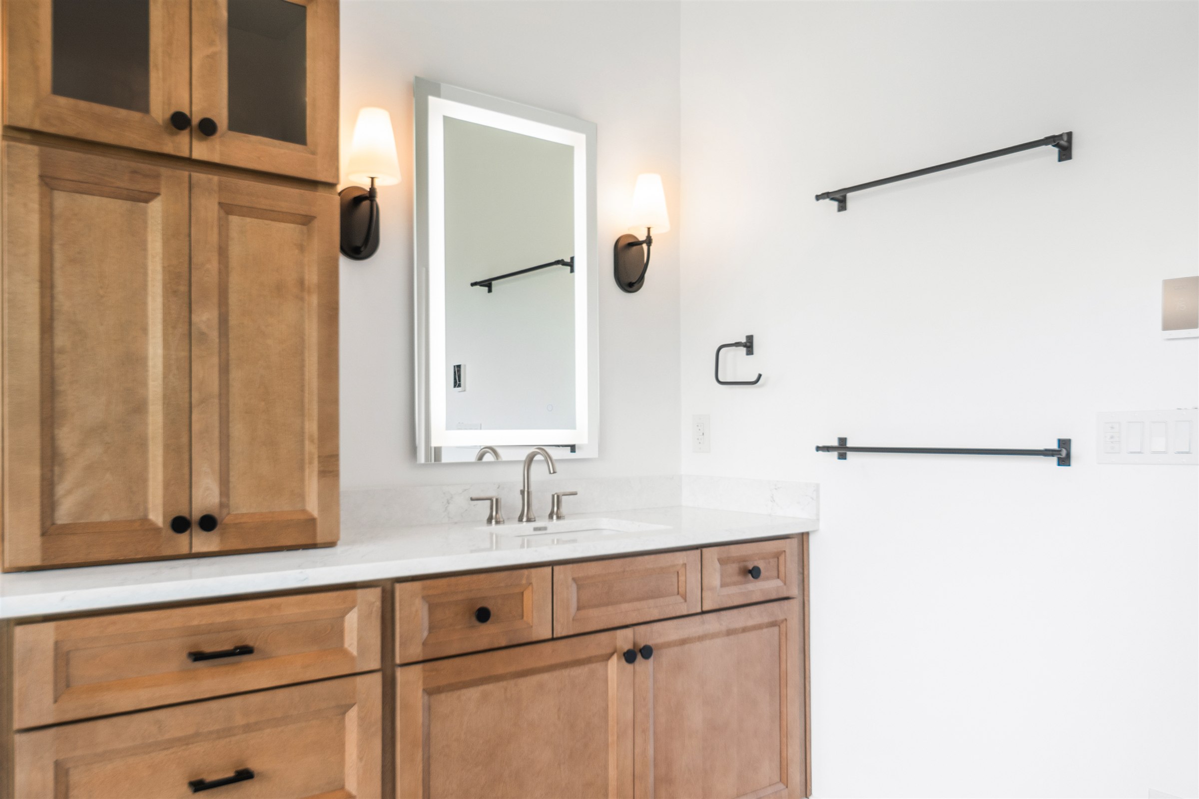 Freestanding tub blue tile accent wall Geist IN
