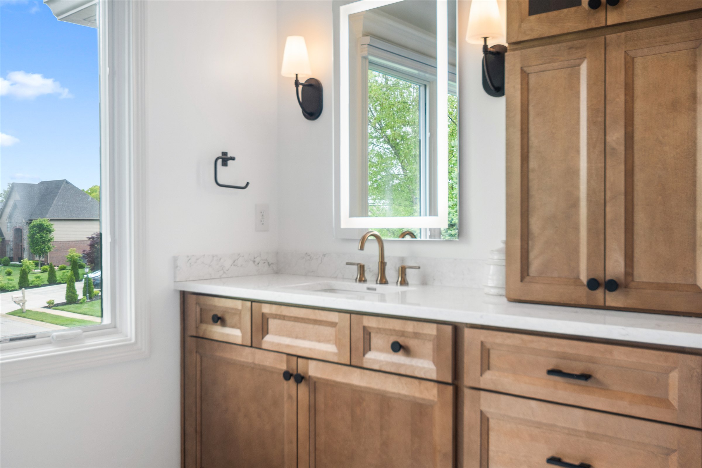 Wood tone vanity bathroom renovation Geist IN