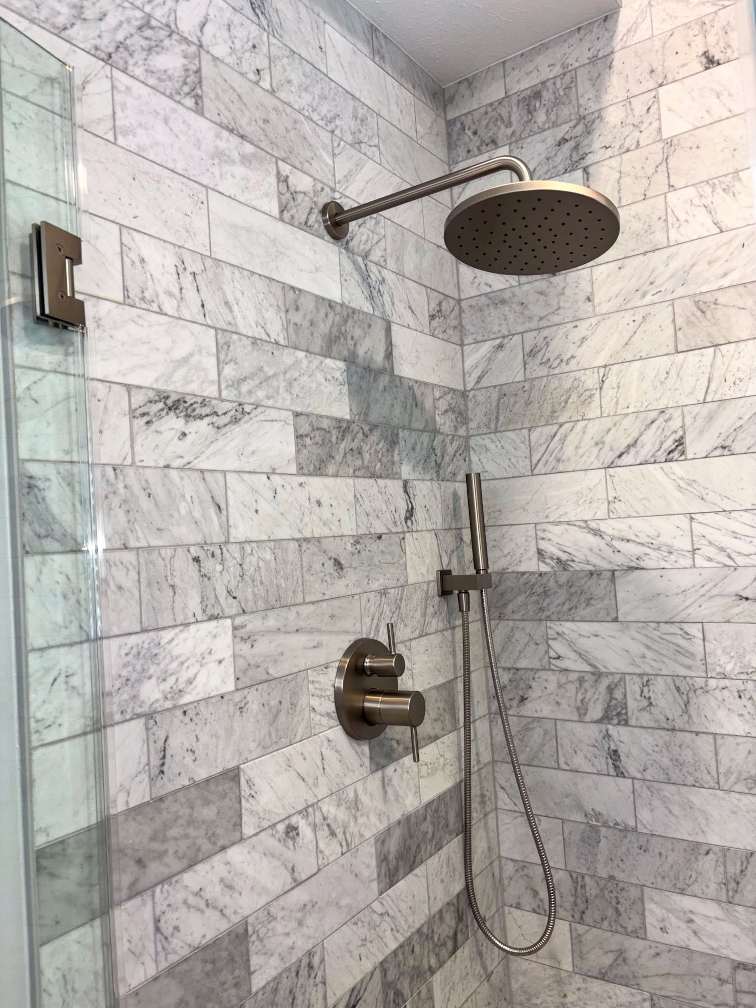 Carrara marble subway tile shower in Fishers IN