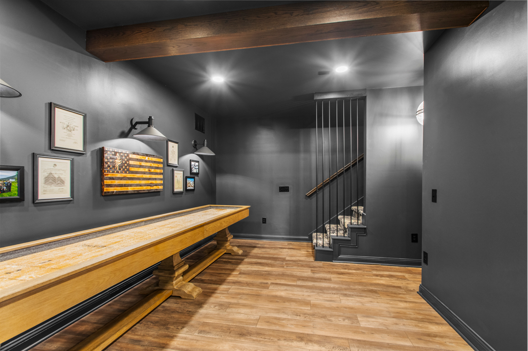 Chairs and squares wainscoting basement feature wall Westfield Indiana