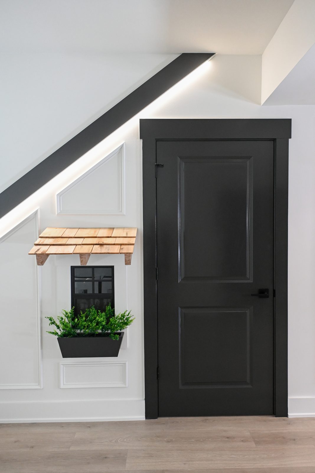 Under stair playhouse door with cedar awning basement Westfield Indiana