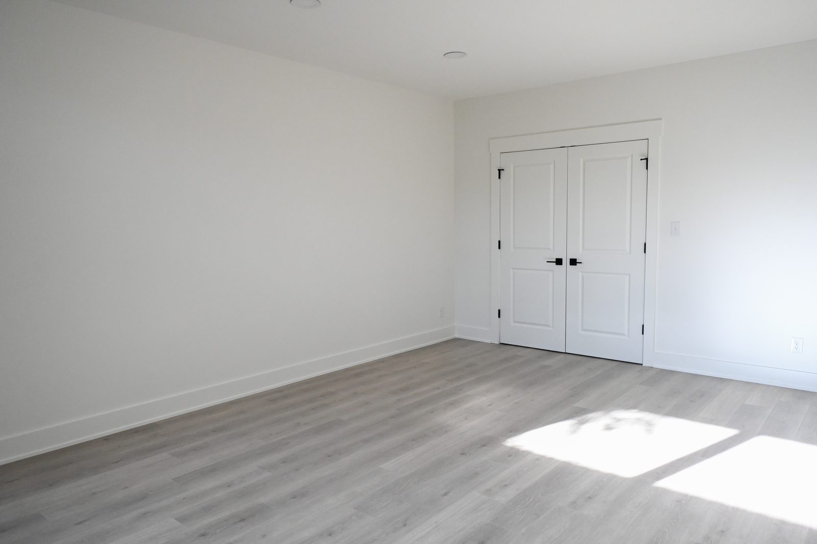 Finished basement guest bedroom with LVP flooring Westfield IN