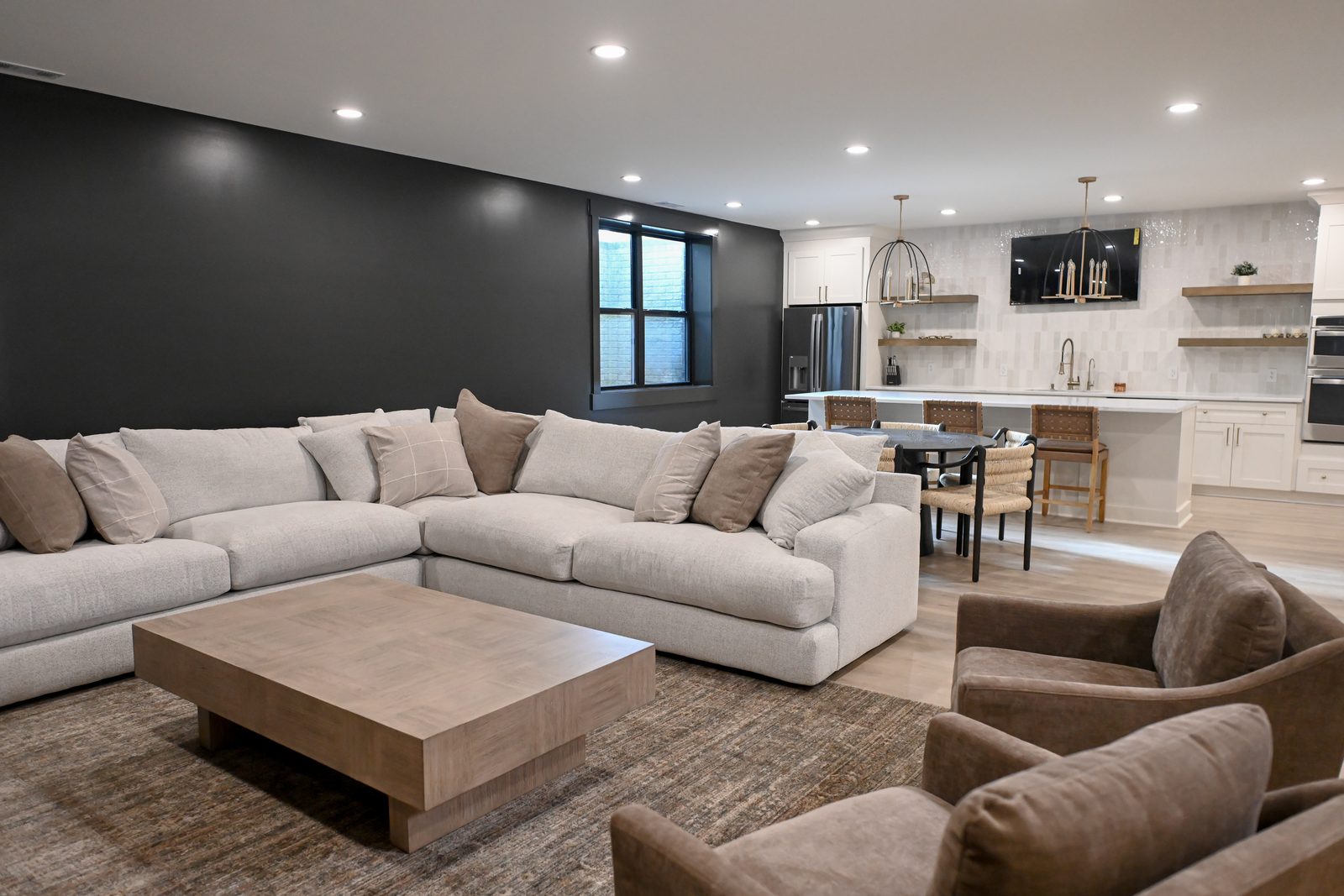 Basement family room open to wet bar and game area Westfield Indiana