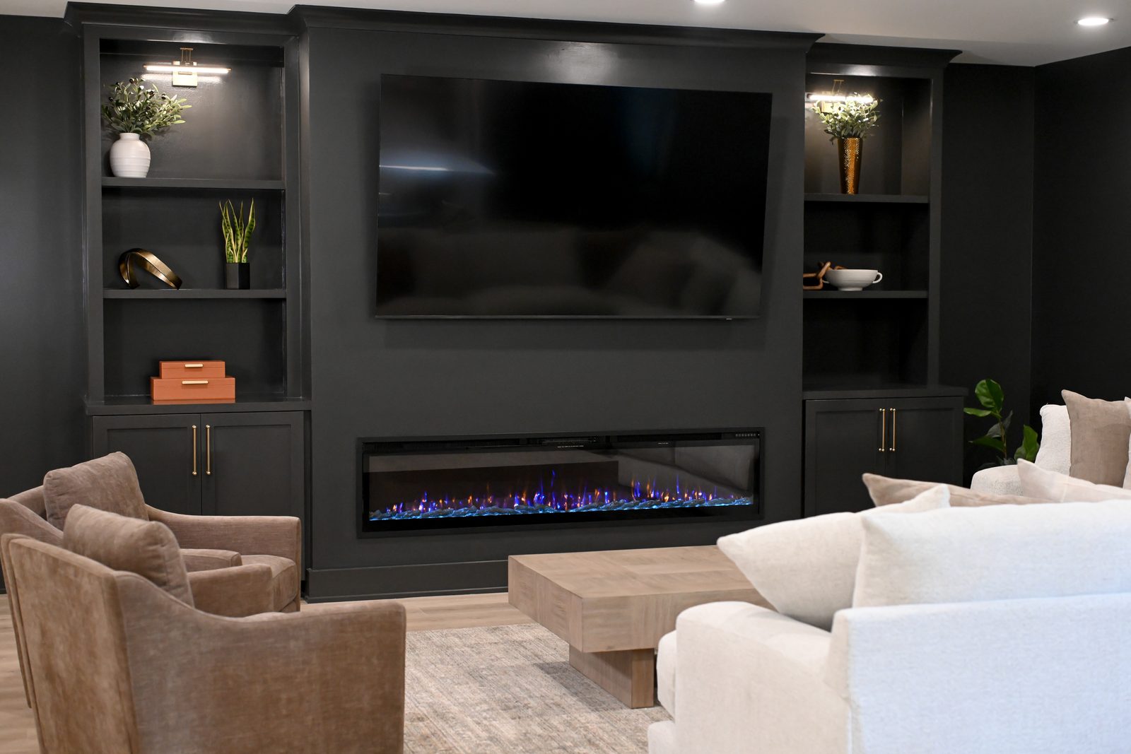 Black entertainment built-in with linear electric fireplace Westfield IN basement