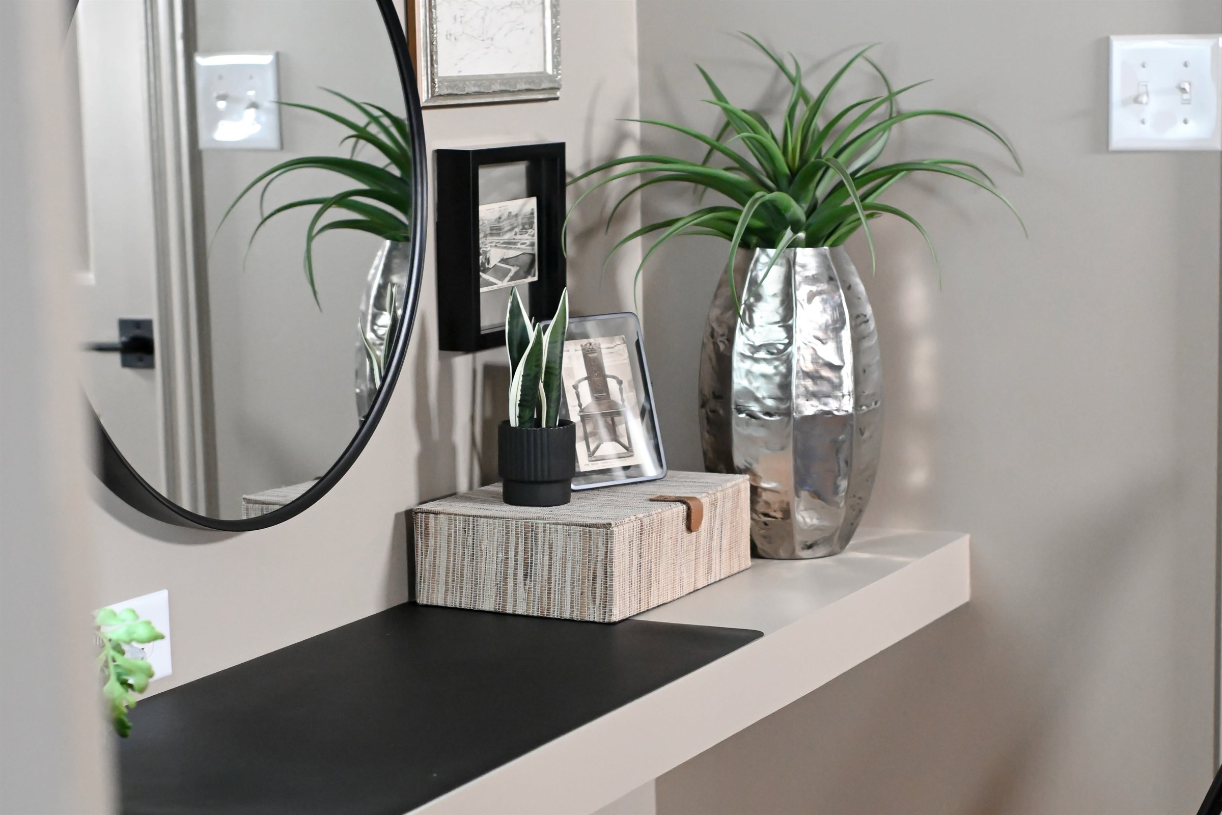 Floating shelf and mirror detail in finished basement Zionsville Indiana