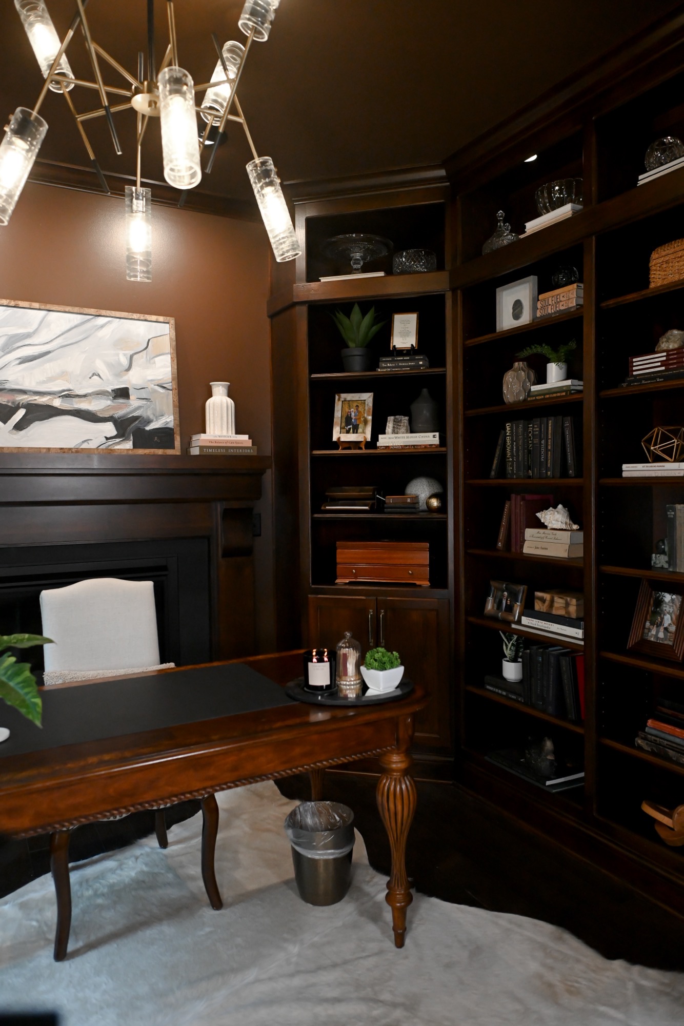 Home office built-in bookcases and brass glass chandelier Zionsville IN